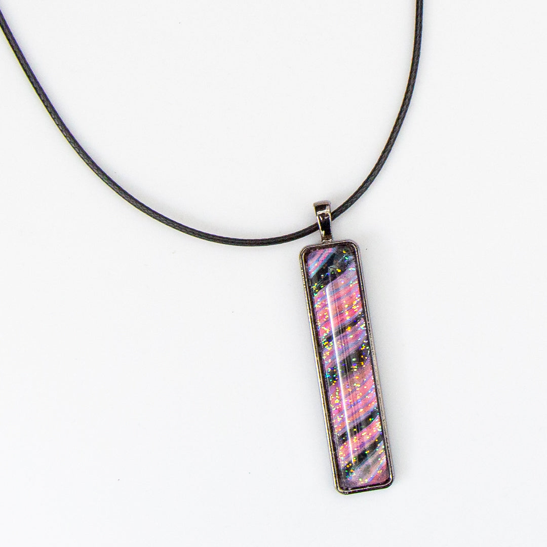 Pink and Black Swirl with Iridescent Sparkles Pendant on Gunmetal Chain